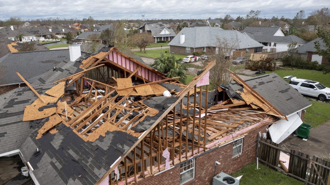 Storm damaged roof requiring emergency restoration support